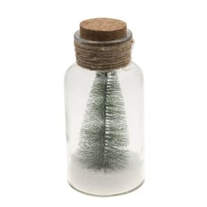 Grantræ med sne i glasflaske