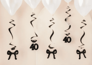 Sort sløjfe swirls 40 år